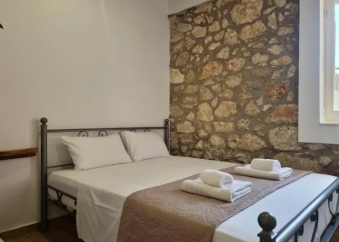 Alekos Cozy Stone 2br Karya Center
